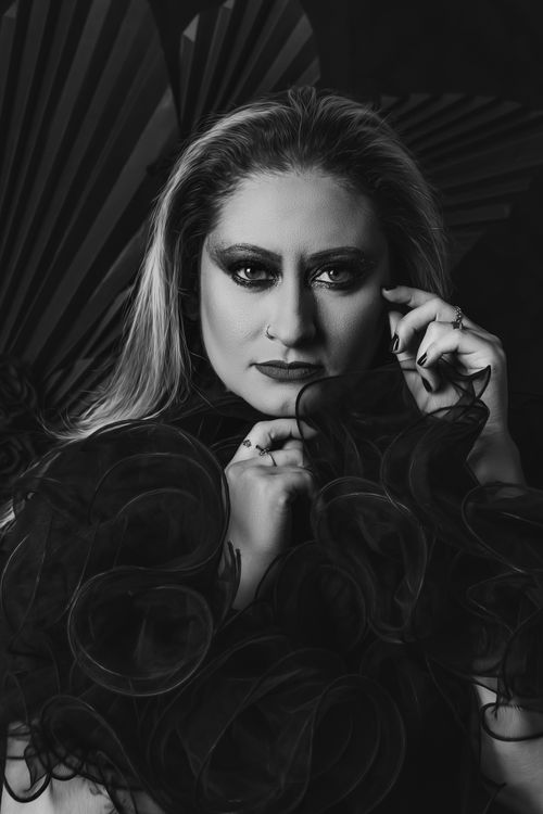 Free Elegant black and white portrait of a woman with expressive eyes and stylish makeup. Stock Photo
