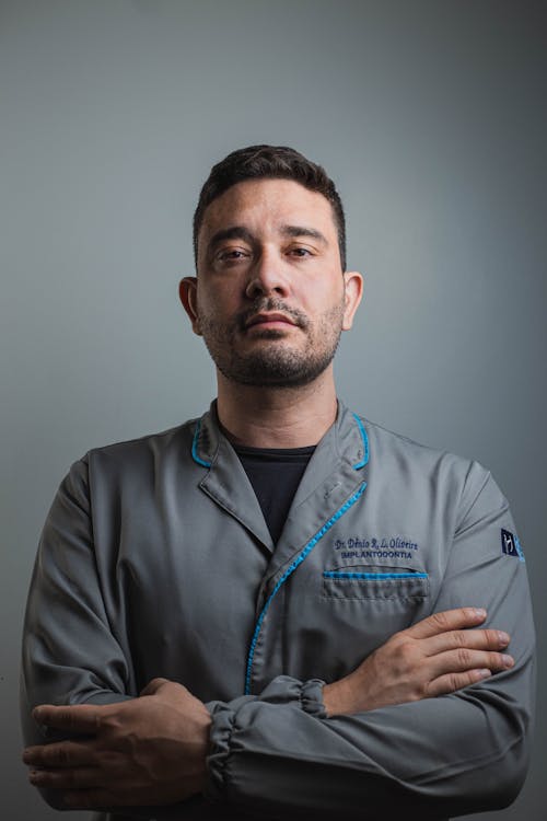 Close-up Photo of Man in a Scrub Suit