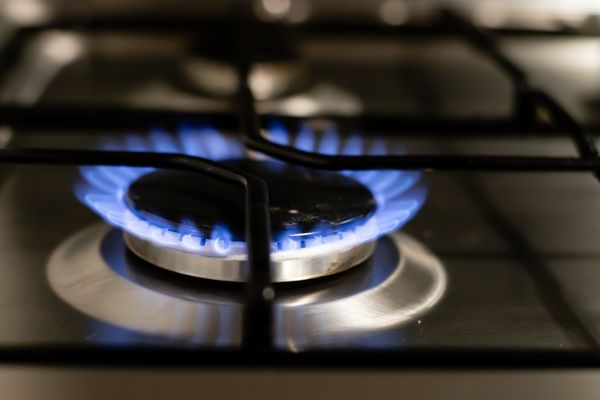 Blue gas flame on a stove burner