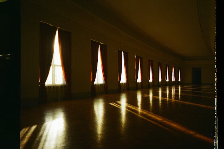 Ornate Ballroom With Windows And Door 