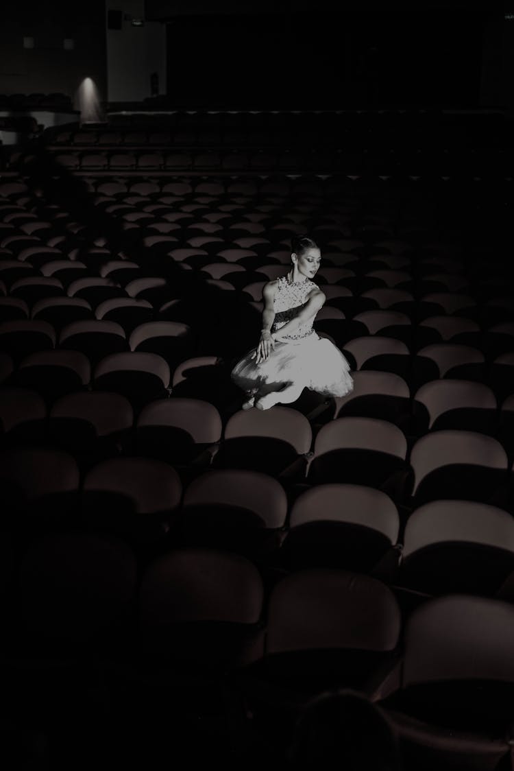 Monochrome Photo Of A Ballerina In A Theatre