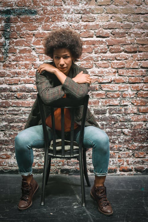 Beautiful Woman sitting on a Chair 