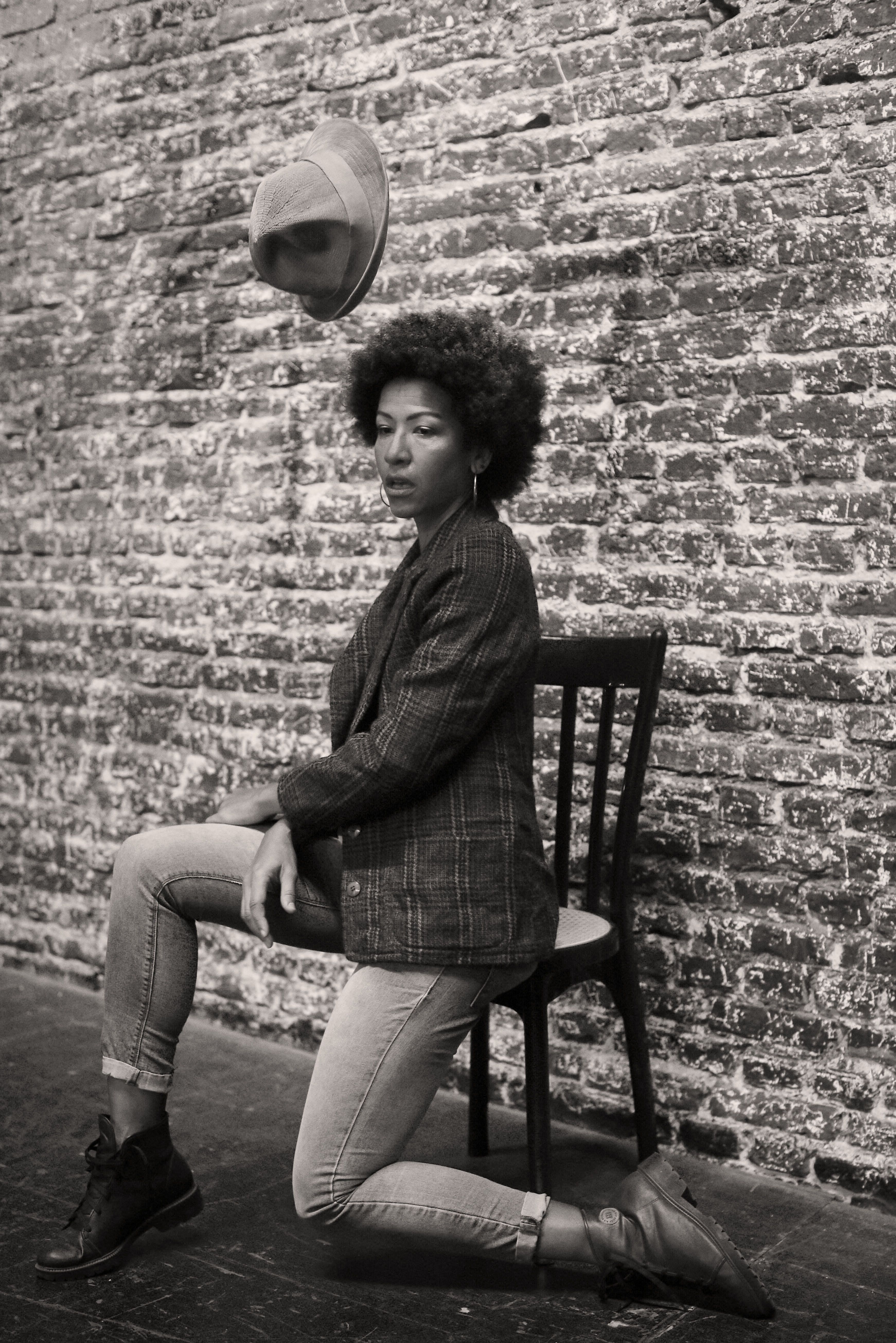 Monochrome Photo of Beautiful Woman sitting on a Chair · Free Stock Photo