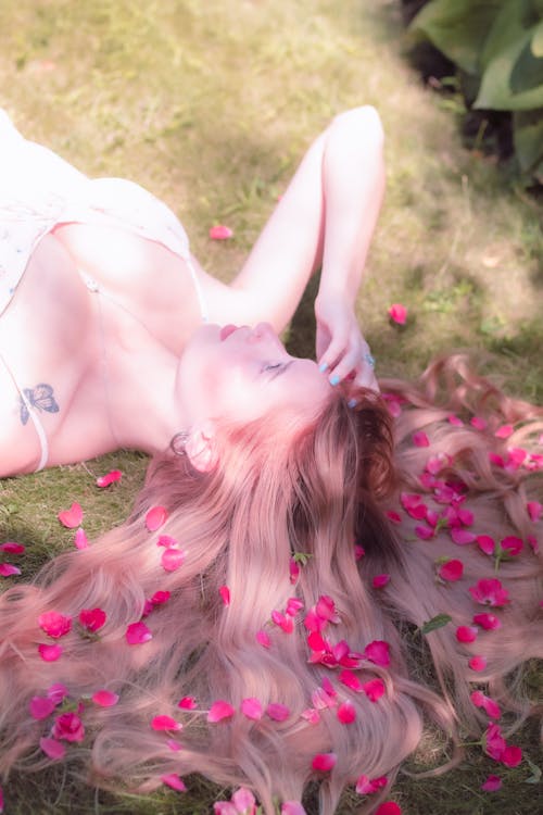 Woman with Petals in Hair