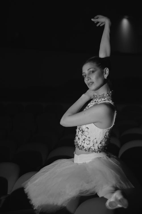 A Woman Wearing Ballet Dress While Posing 