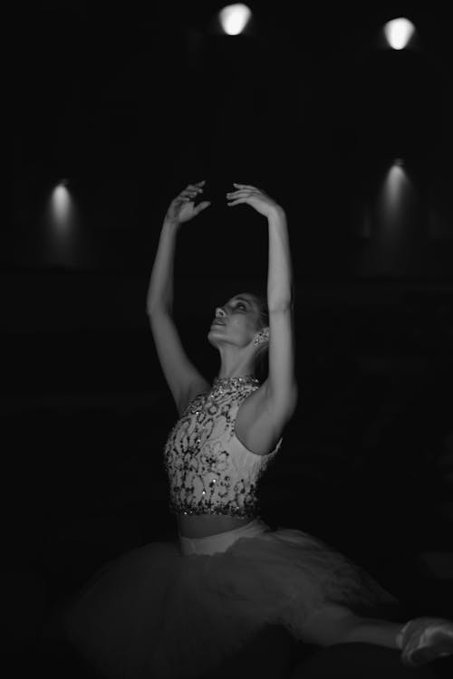 Grayscale Photo of a Ballerina Dancing