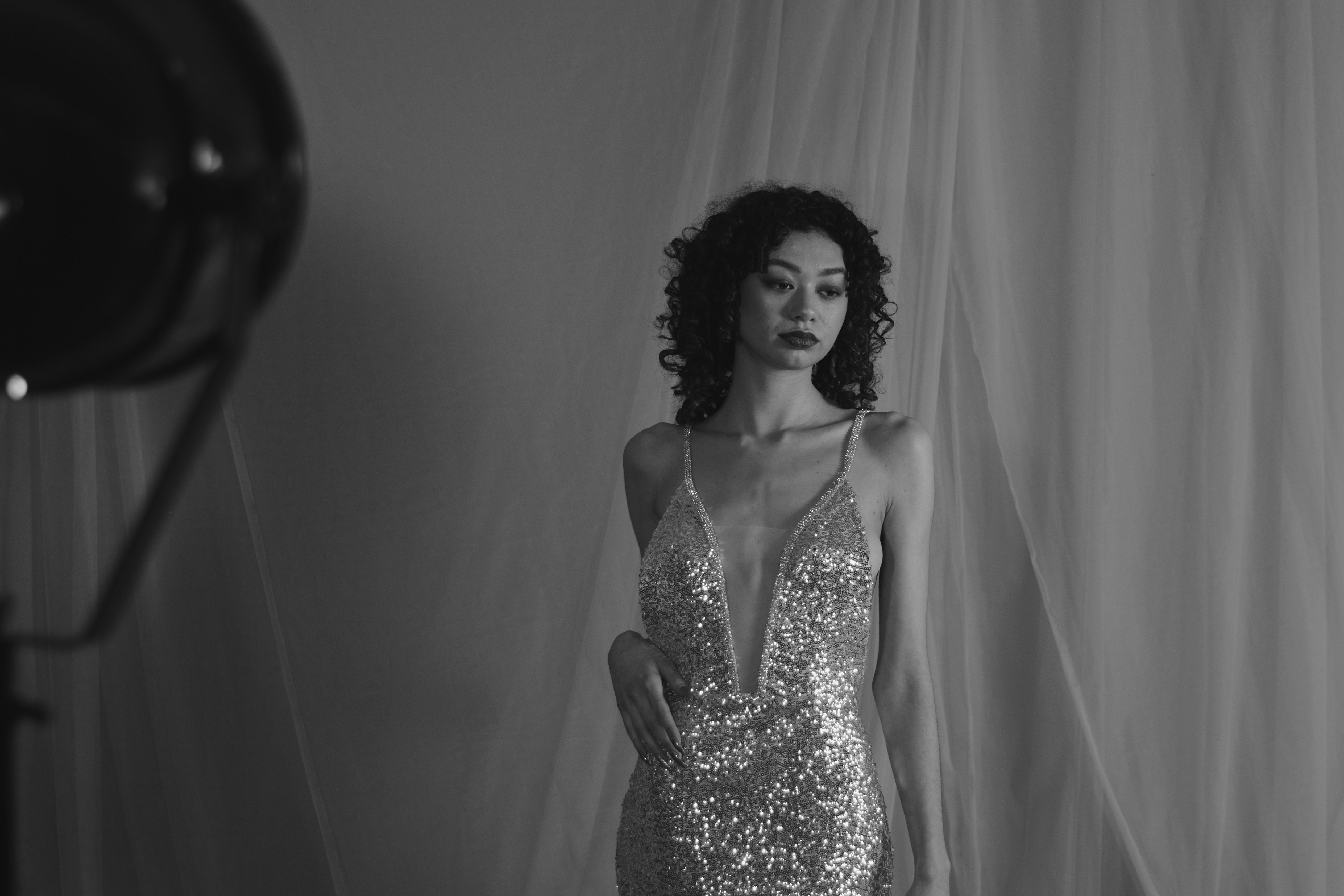 Grayscale Photo of a Woman in a Dress · Free Stock Photo