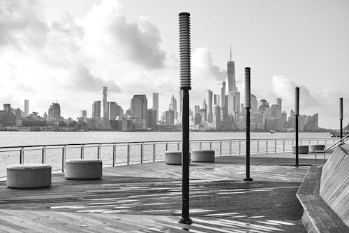 Grayscale Photo of City Skyline