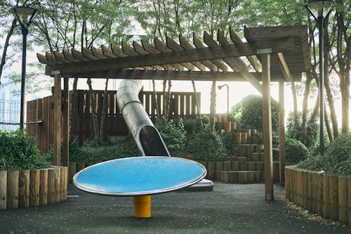 Slide and a Carousel on a Playground 