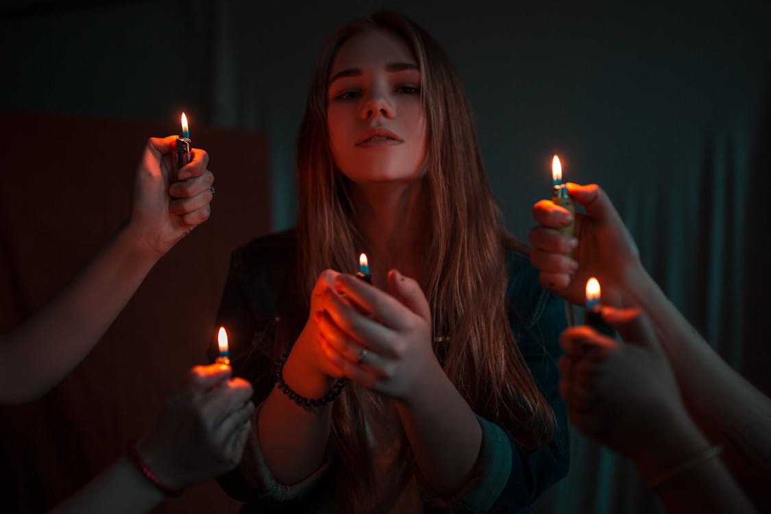 Free Woman Holding Disposable Lighter Stock Photo