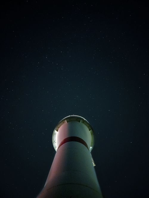 Free A majestic view of Şile Lighthouse under a starry sky in Istanbul, Turkey. Stock Photo