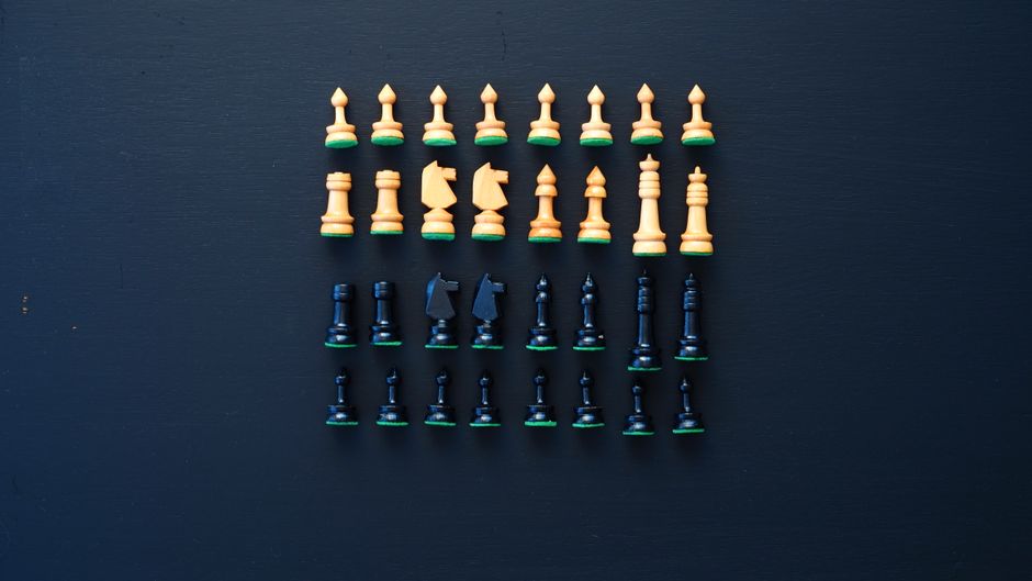 chess pieces wooden board
