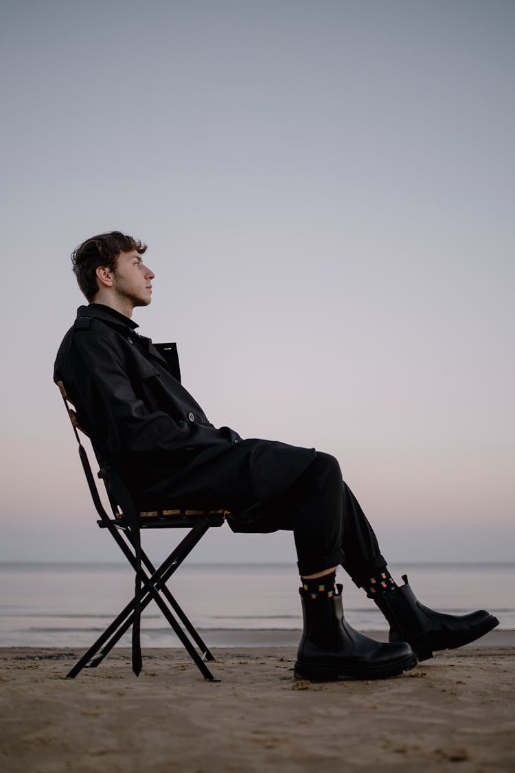 Man On Chair On Beach