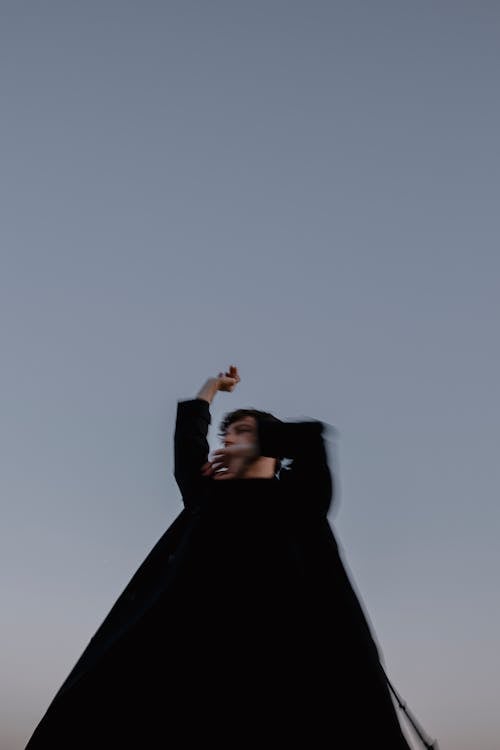 Blurred Picture of Man under Clear Sky