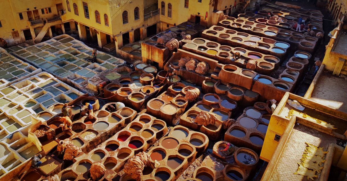 Interior of a traditional Moroccan riad courtyard with zellige tiles