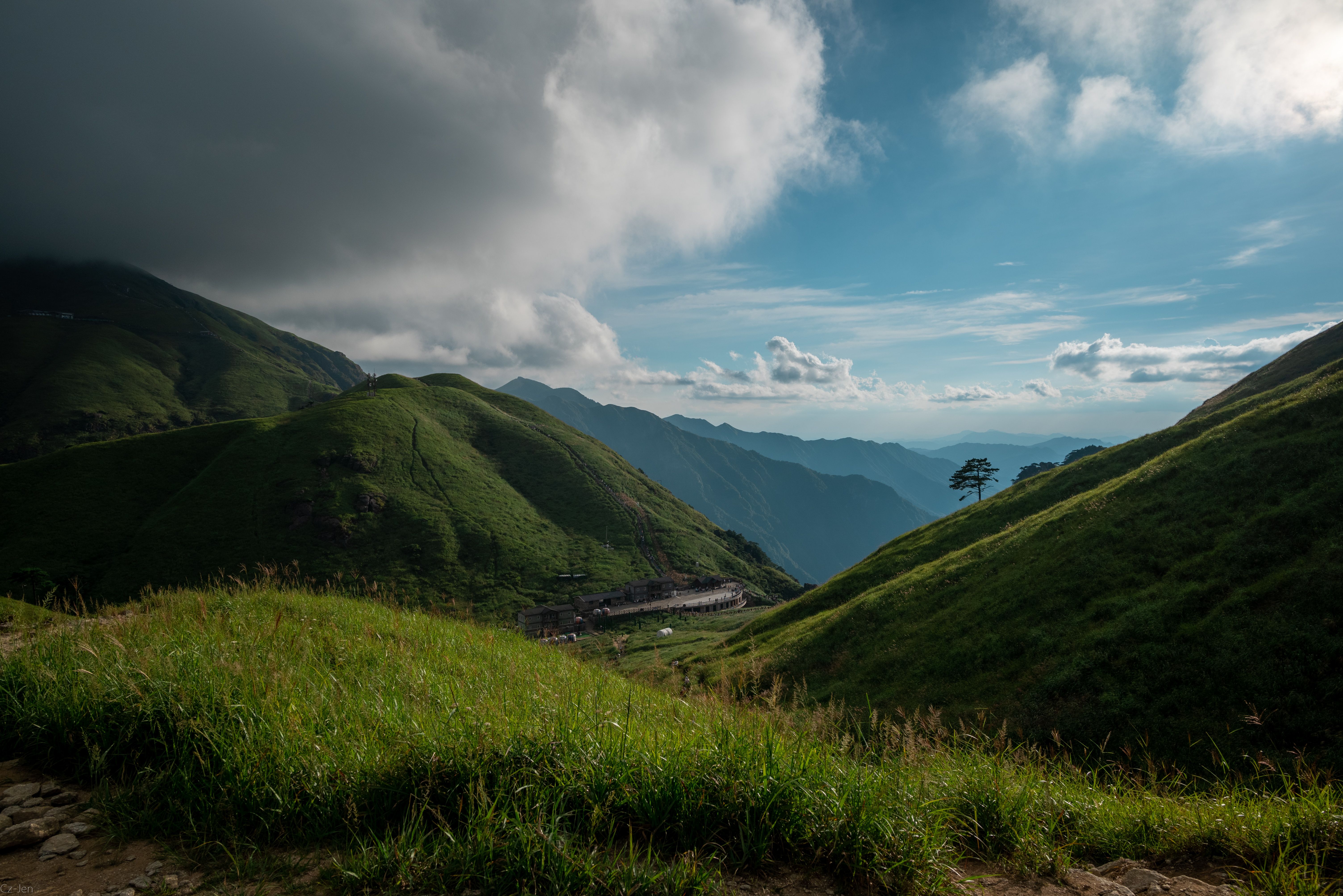 Green Grass Field and Mountains Under White Clouds and Blue Sky · Free ...