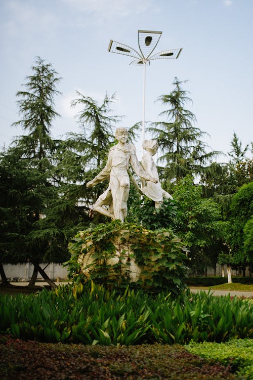 Statues of Young Pioneers in a Park