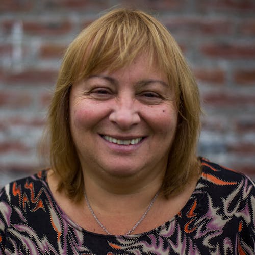 Close Up Photo of a Woman Smiling