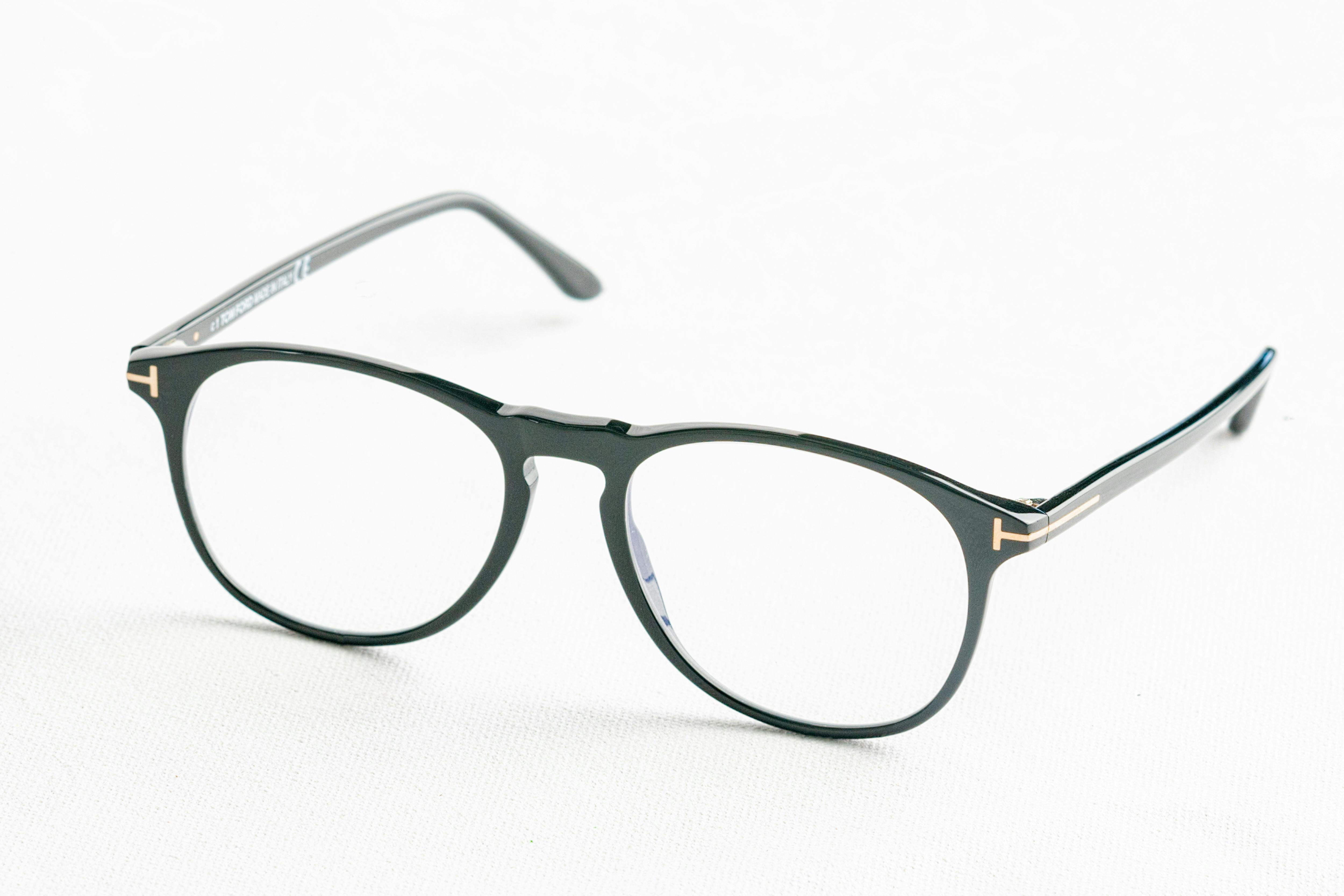 Brown-Framed Eyeglasses on a Calendar · Free Stock Photo