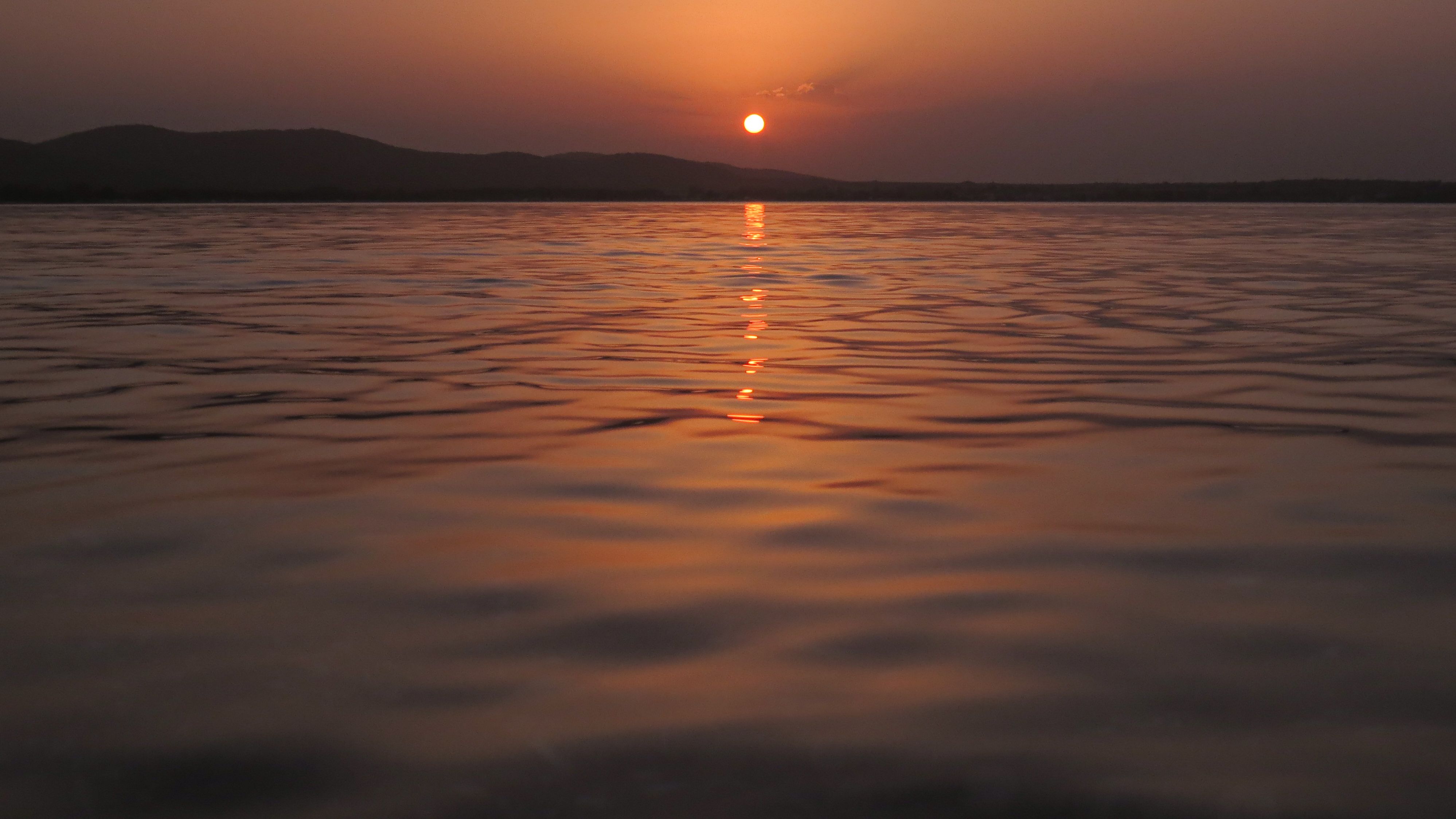 A View of the Sea During Sunset · Free Stock Photo
