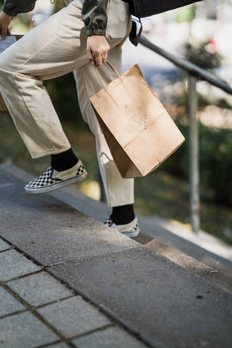 Woman With Bag Walking Stairs