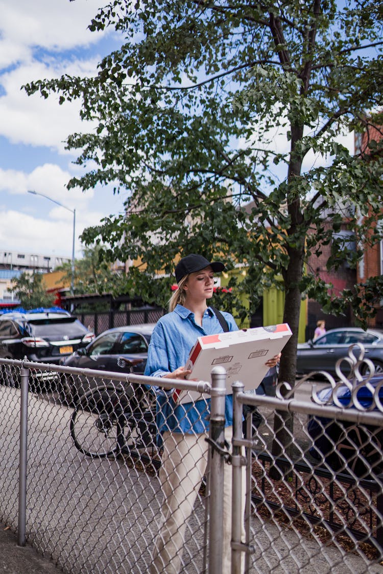 Woman Delivering Pizza