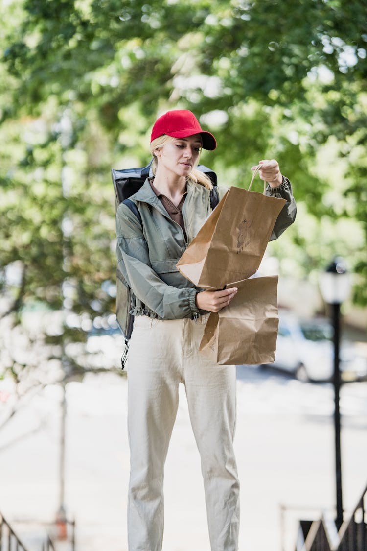 Delivery Woman With Paper Bags 