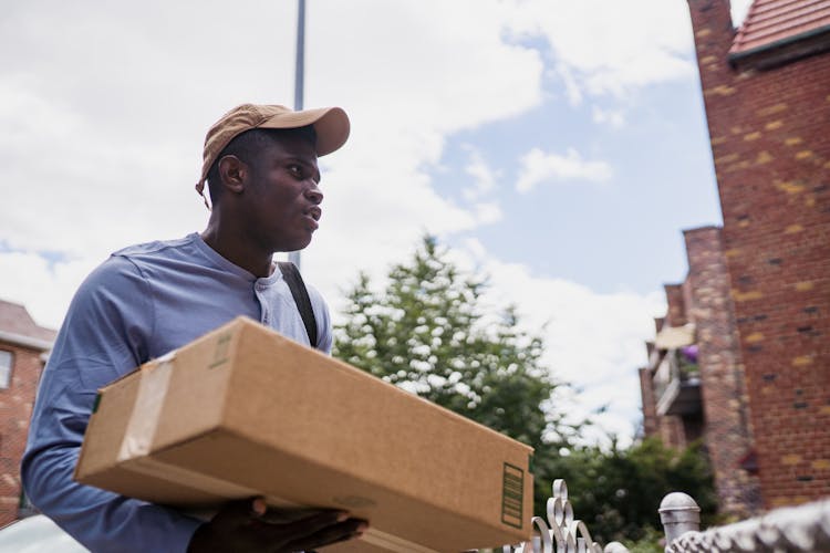 Delivery Man Carrying Box