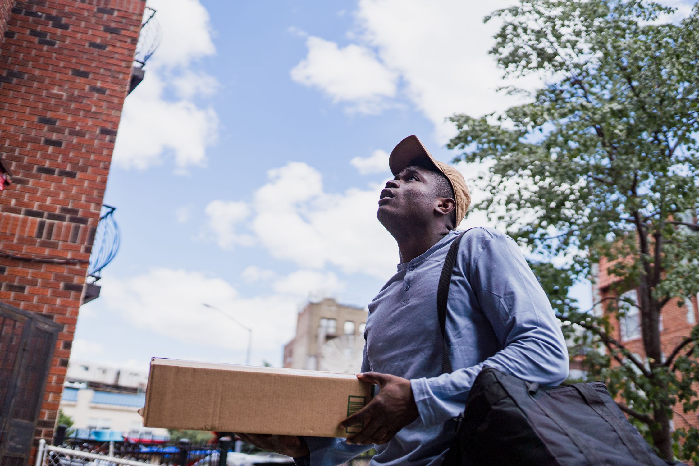 Delivery man looking for address