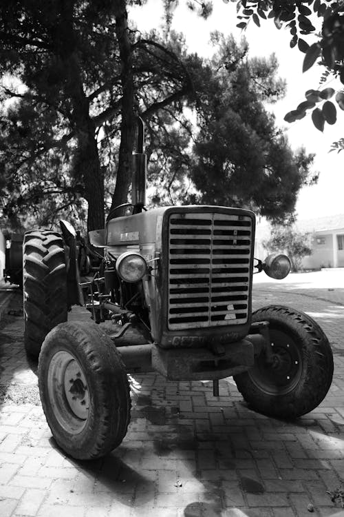 Grayscale Photo of a Tractor