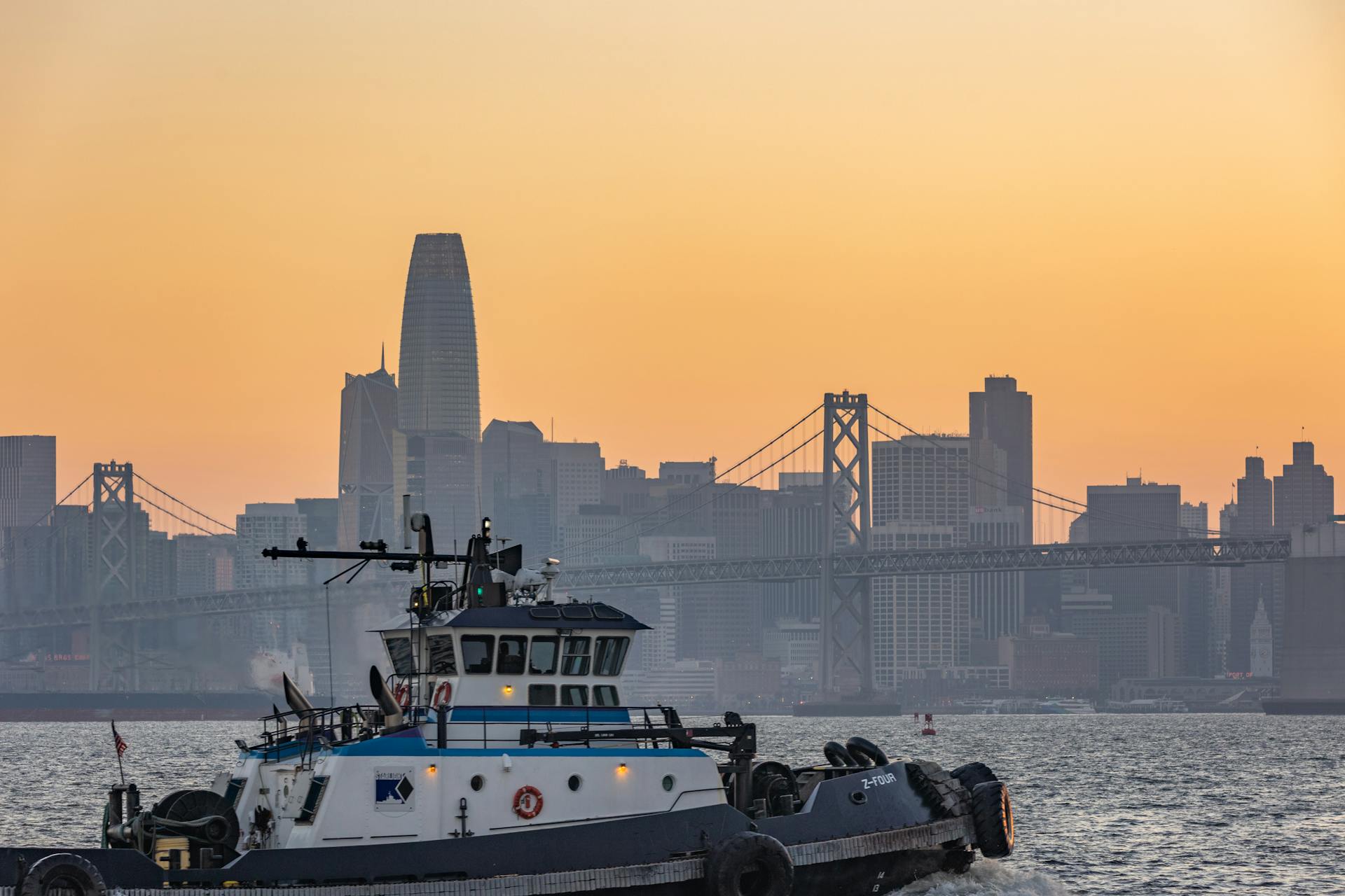 Boat in Harbor During Sunset