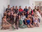 Group of Young People Holding Cameras and Smiling