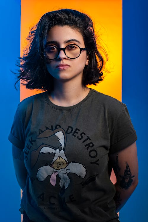Woman in a Shirt Wearing Eyeglasses