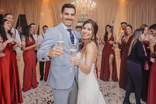 Newlyweds Holding Champagne Glasses