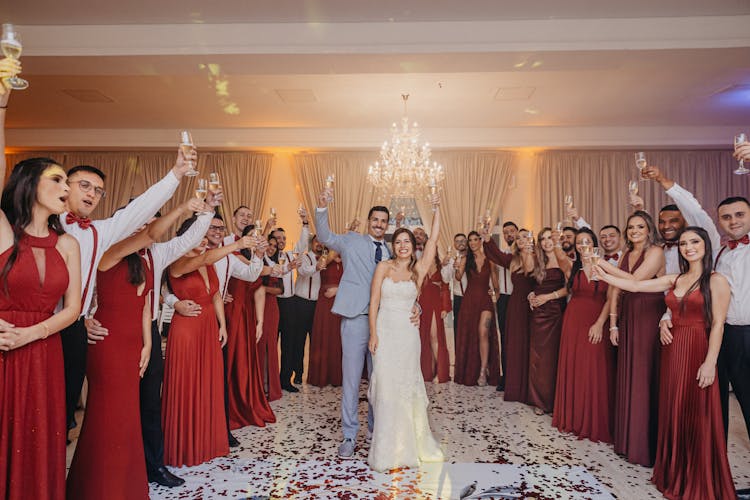 Bride And Groom With Their Entourage