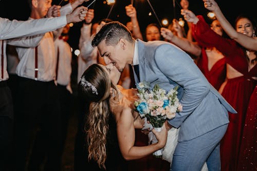 Free Romantic Newlyweds Kissing Each Other Stock Photo