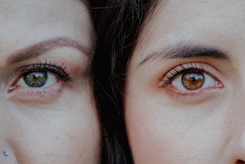 Close-Up Photo of Women's Eyes