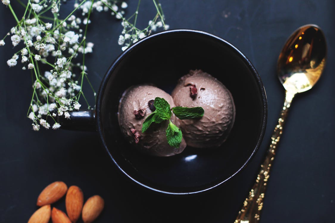 Ice Cream on Bowl Beside Spoon