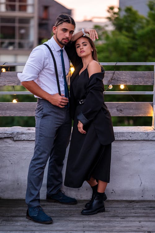 Fashionable Couple Posing Together