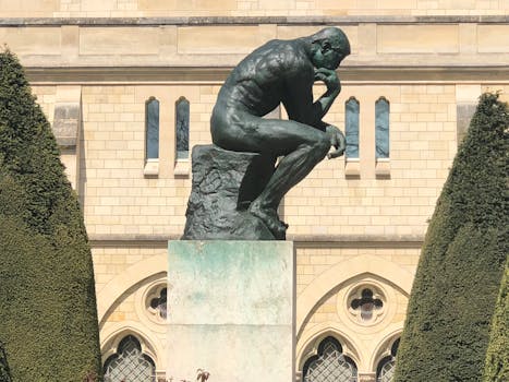 Man Sculpture in Deep Thought and Contemplation
