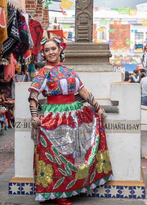 Woman Wearing a Traditional Colorful Dress