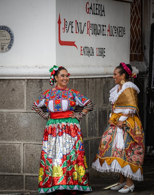 Happy Women Dressed in Traditional Mexican Clothing 