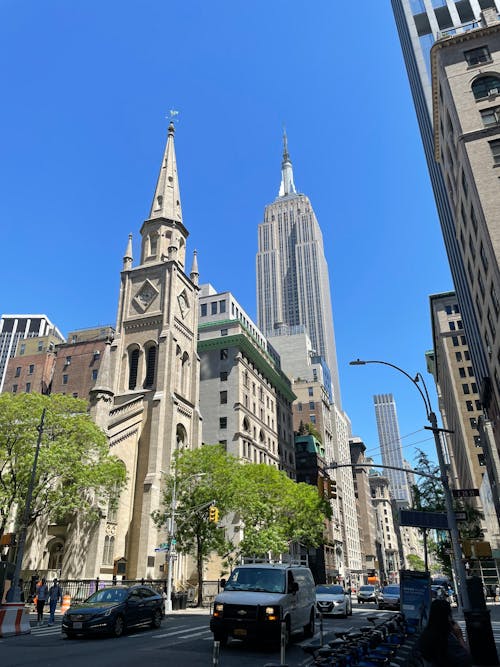 Free Marble Collegiate Church and Empire State Building behind in New York Stock Photo