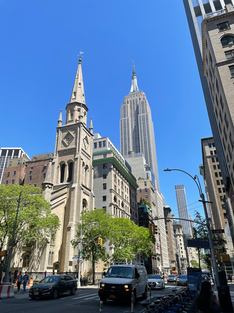 Marble Collegiate Church And Empire State Building Behind In New York