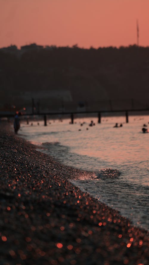 Photos gratuites de aube, bord de l'océan, bord de mer