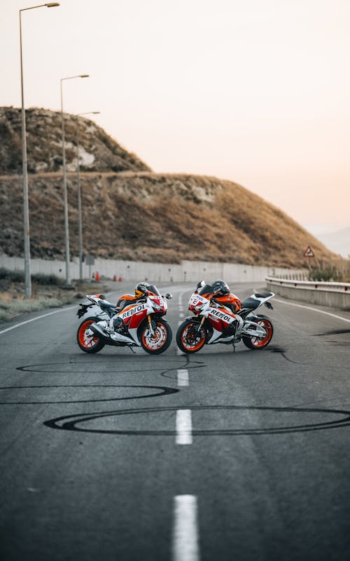 Motorcycles Parked in the Middle of the Road