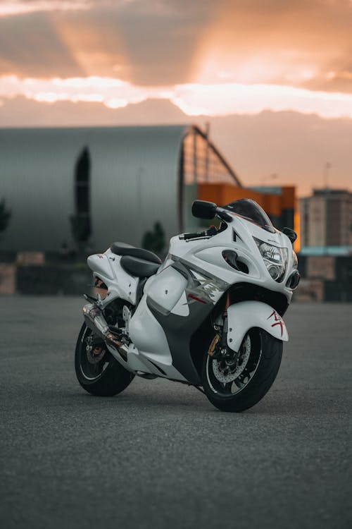 White Motorcycle under Evening Sky