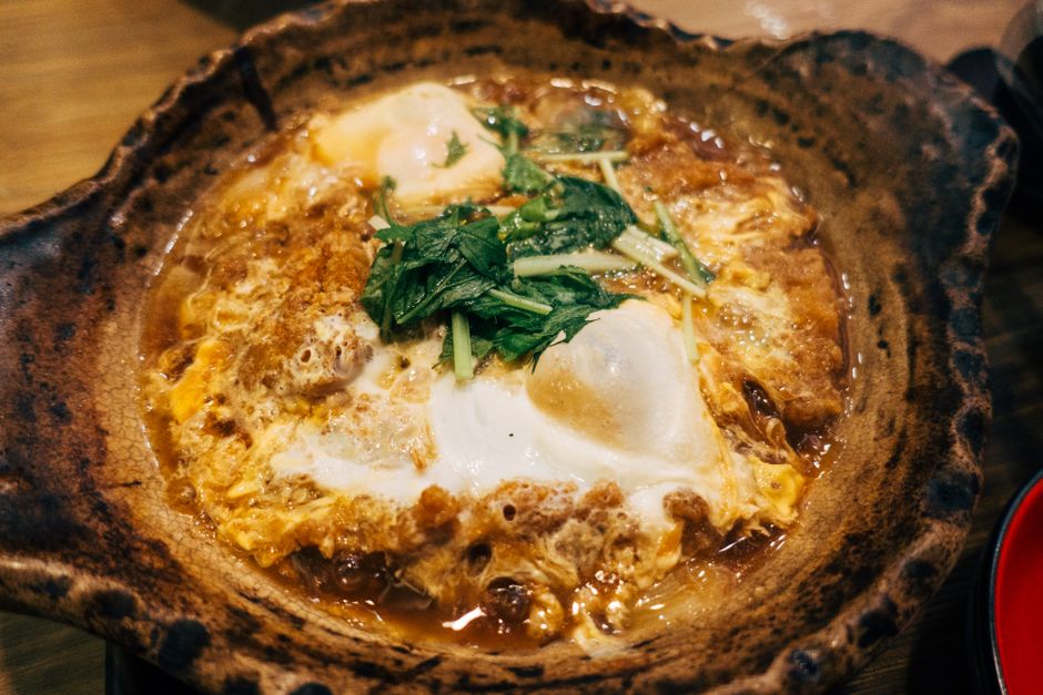 Mouth-watering Japanese egg dish with vegetables, perfect for a hearty meal.