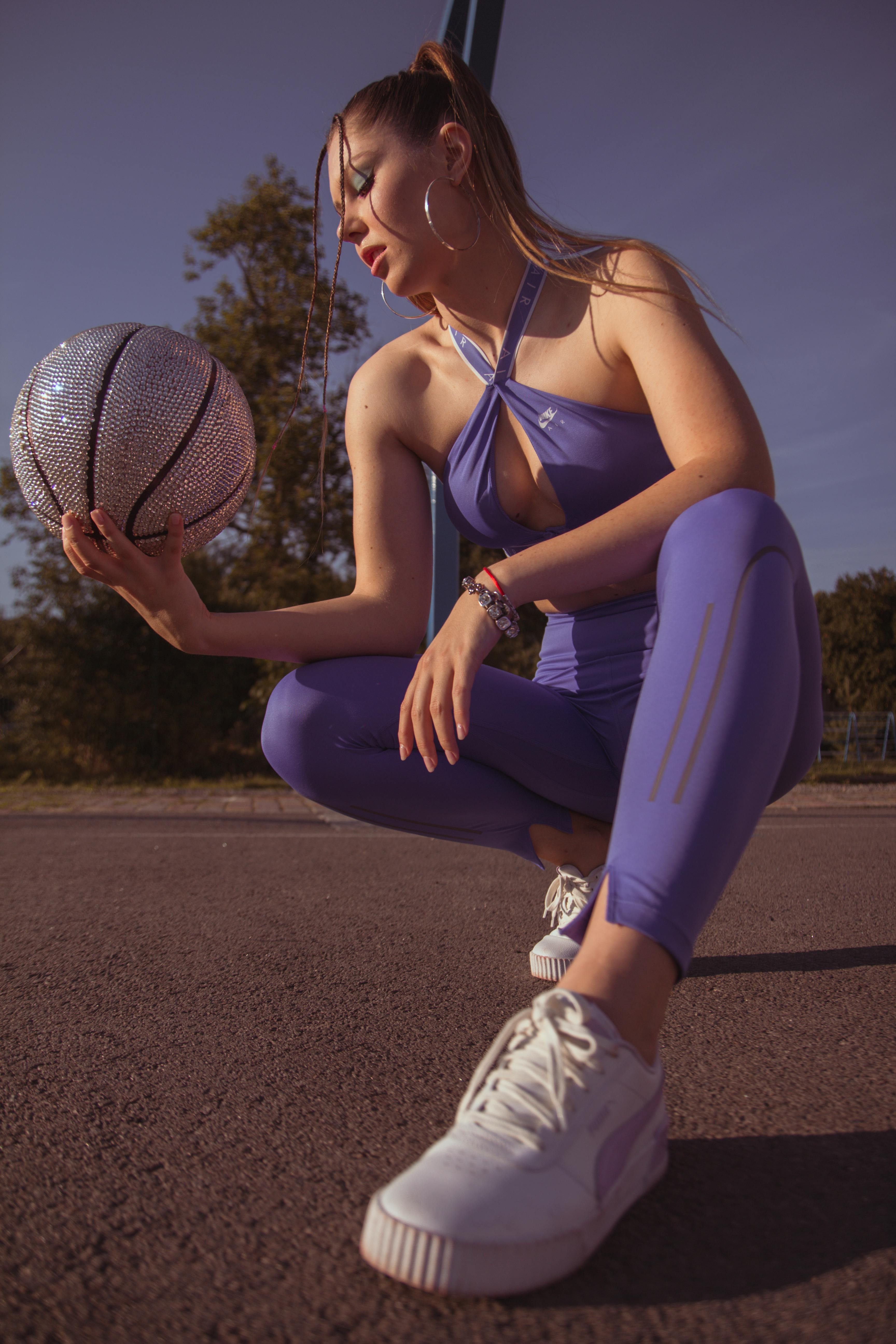 Woman in LA Lakers T-shirt and with Basketball Ball · Free Stock Photo