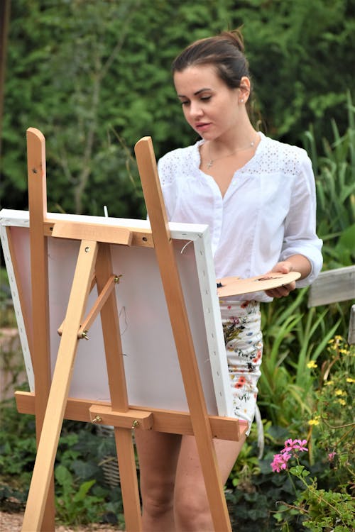 Photo of a Woman Painting